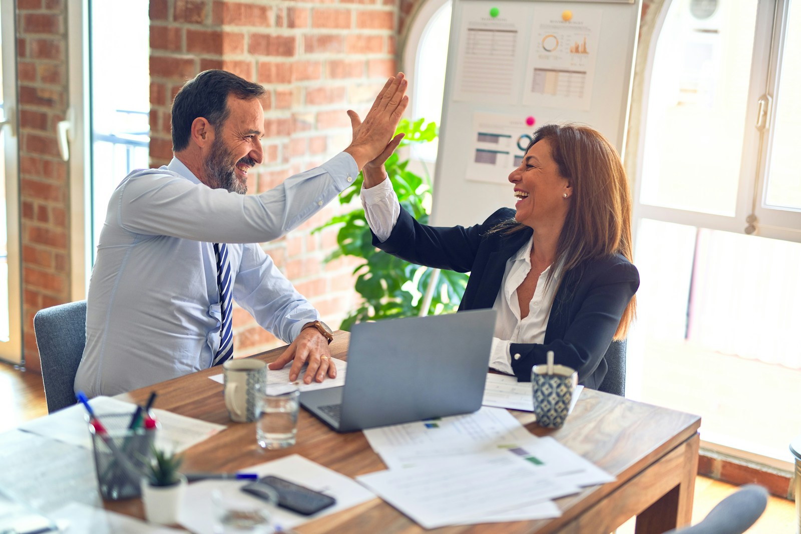 People reviewing financial plans together